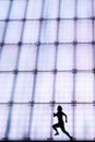 Young Girl Runninging by Chongqing Grand theater at night